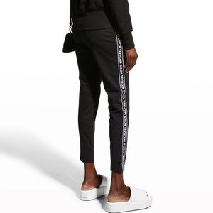 MICHAEL Michael Kors cotton-blend pants w logo taping down the sides Relaxed fit
